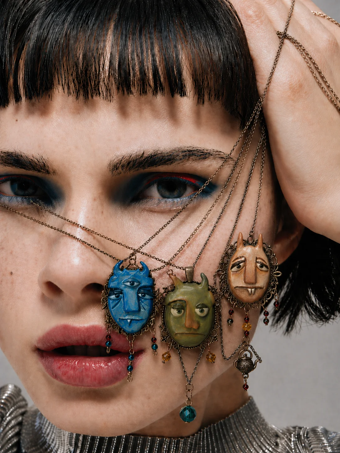 Blue div necklace editorial slide